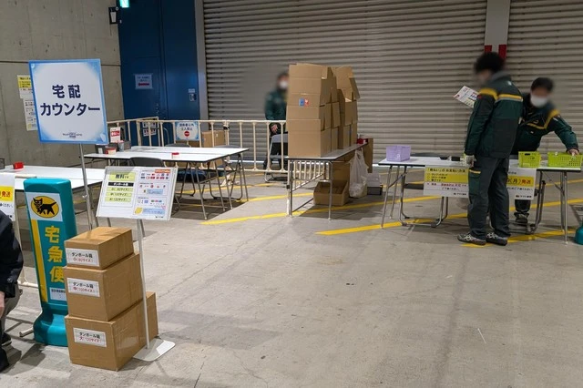 hololive SUPER EXPO2026 グッズの現地受け取りの出口に宅配便カウンター